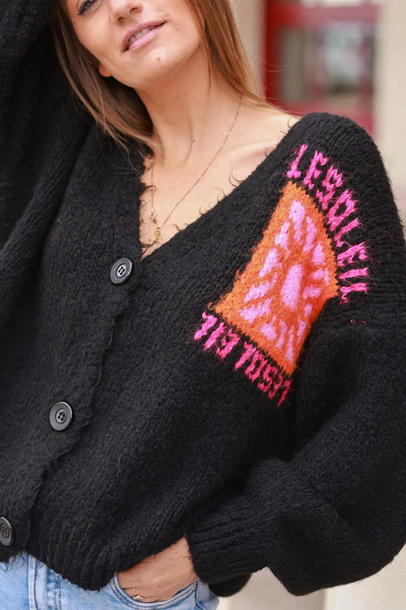 Gilet noir en grosse maille avec gros boutons le Soleil manches bouffantes